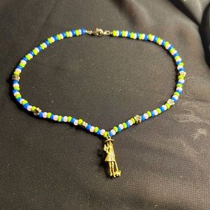 Cute beaded Kids necklace with Brass charm. Unbranded